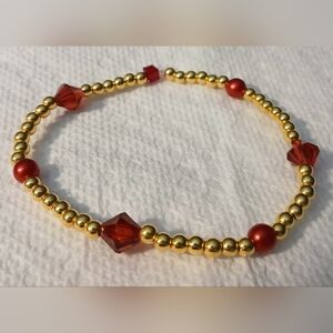 NWT Handcrafted Elegant Gold and Garnet Red (Janurary), Beaded Bracelet.